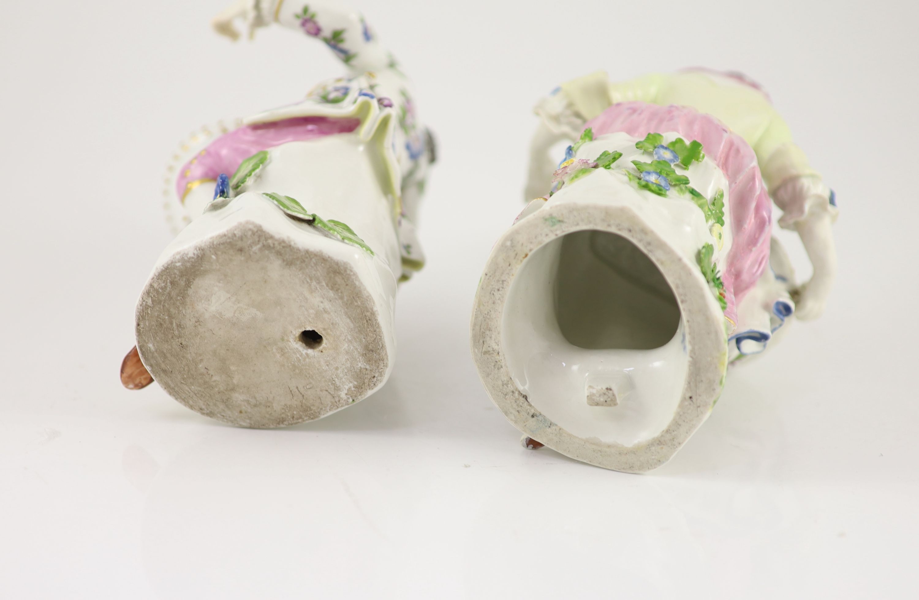 A pair of Meissen figural flower holders c.1755, 20cm and 19.5 cm high, restoration